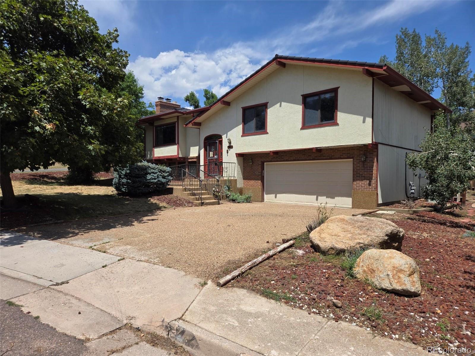Country Club Estates Colorado Springs Home | MLS #: 78371923590  Clubheights Drive, Colorado Springs Beds: 4 Baths: 3 Price: $494,900