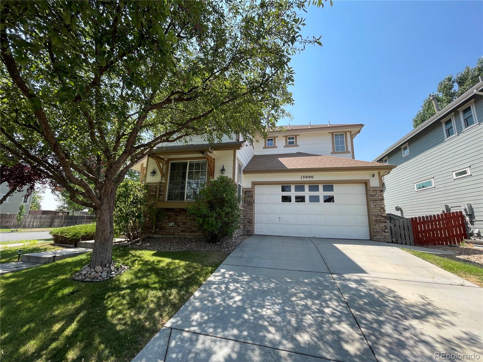 13990 E 106th Drive, commerce city MLS: 6398685 Beds: 5 Baths: 4 Price: $615,000