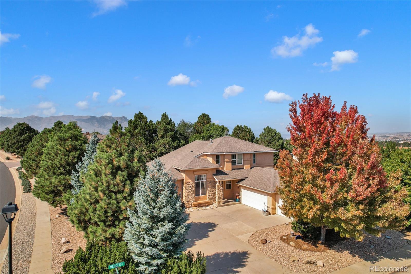 University Park Colorado Springs Home | MLS #: 96778855610  Mercer Drive, Colorado Springs Beds: 5 Baths: 4 Price: $750,000