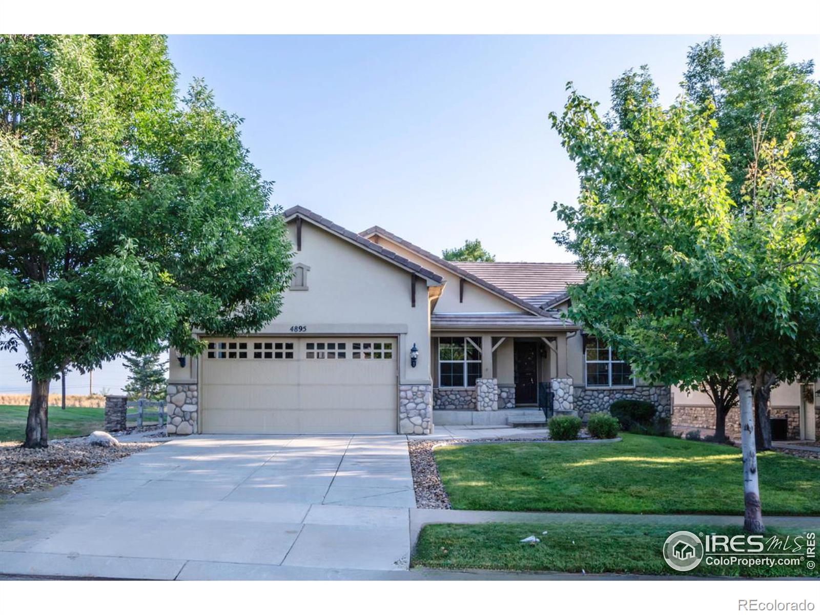 4895  Bierstadt Loop, broomfield MLS: 4567891015812 Beds: 3 Baths: 3 Price: $975,000