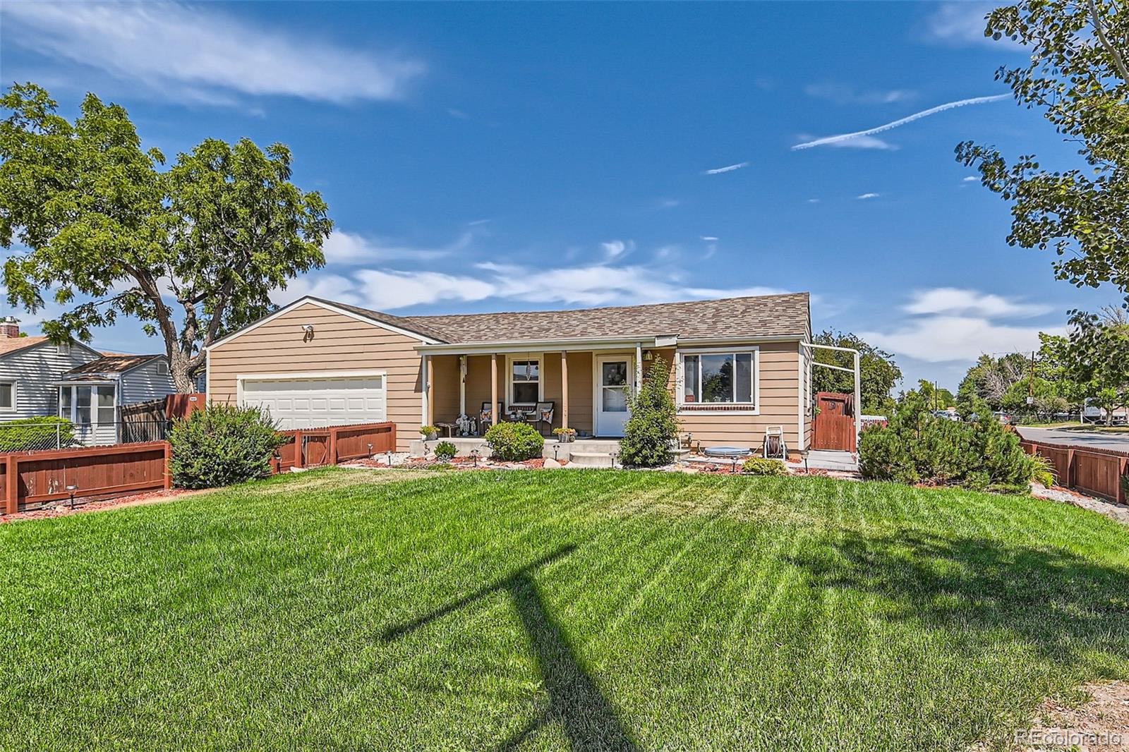 6991 E 64th Avenue, commerce city MLS: 4354172 Beds: 4 Baths: 2 Price: $475,000