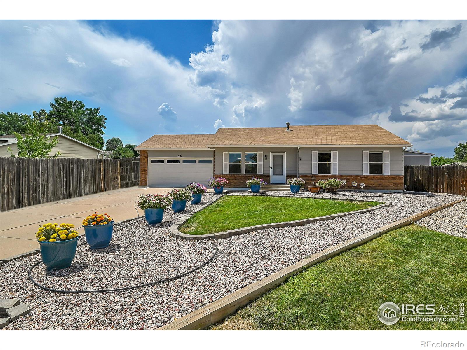 641 W 39th Street, loveland MLS: 4567891016148 Beds: 4 Baths: 3 Price: $520,000