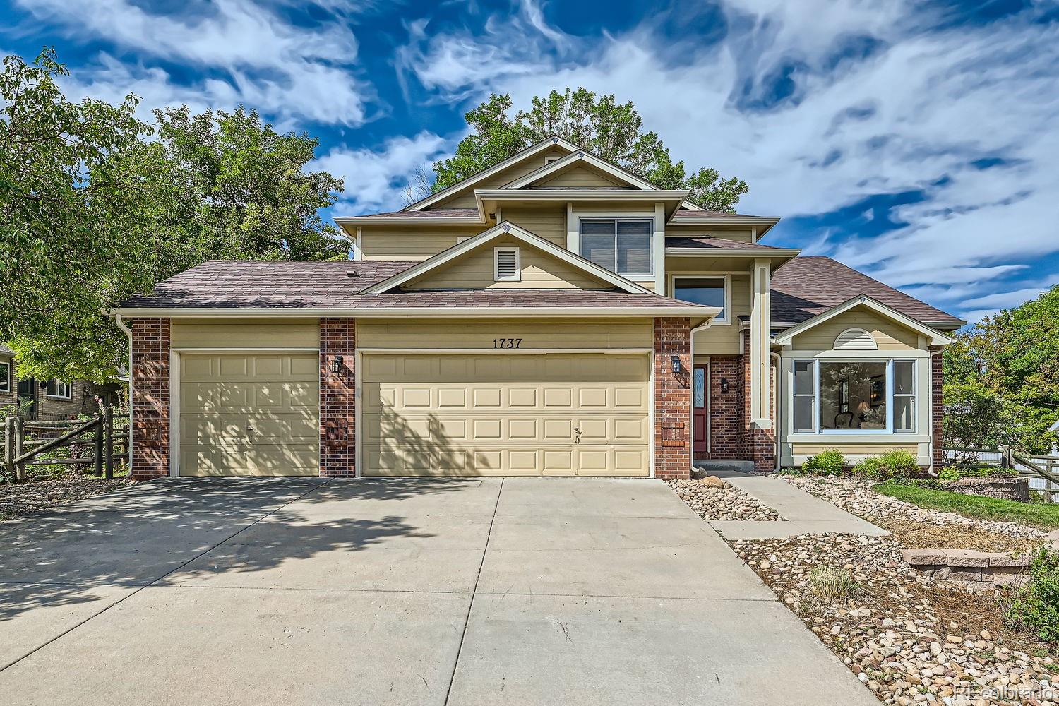 1737  Little Bear Drive, longmont MLS: 4403674 Beds: 4 Baths: 3 Price: $650,000