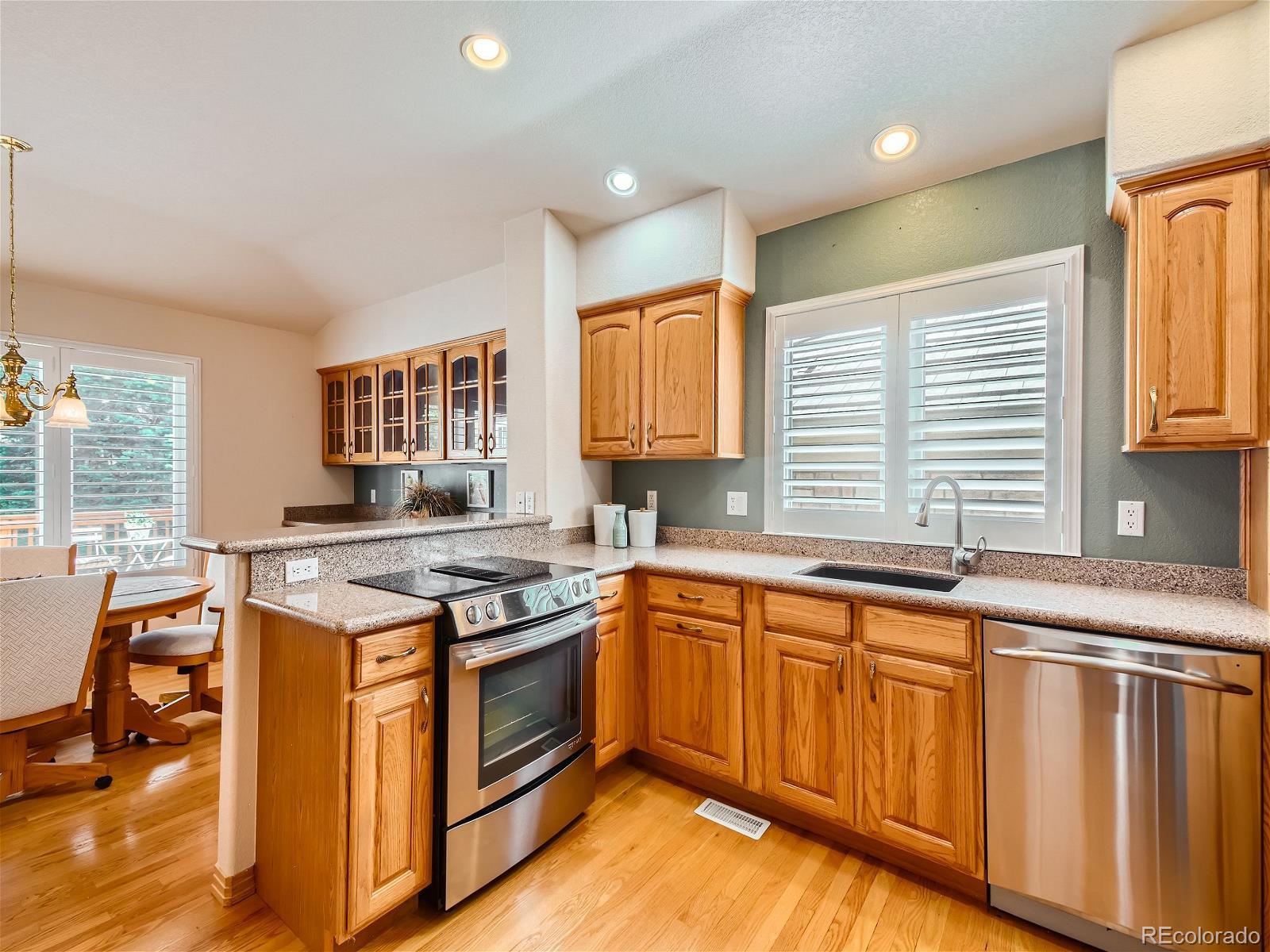 13990 E Chenango Drive , Aurora  MLS: 5153510 Beds: 3 Baths: 3 Price: $699,950