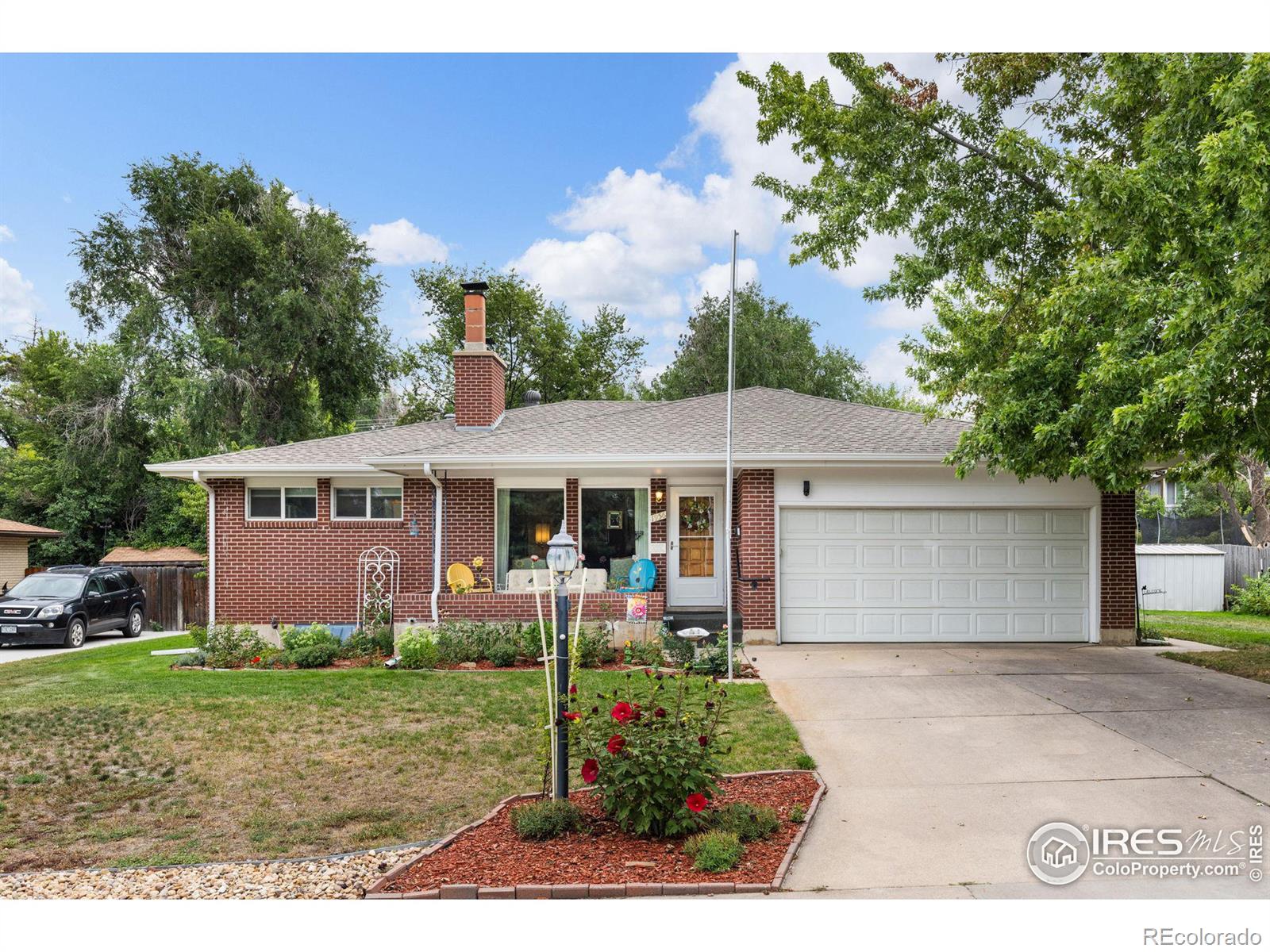 1956  23rd Ave Ct, greeley MLS: 4567891017115 Beds: 4 Baths: 3 Price: $415,000