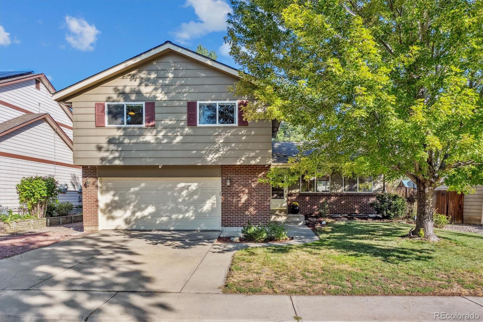 13827 W 66th Way, arvada MLS: 6058372 Beds: 4 Baths: 3 Price: $650,000