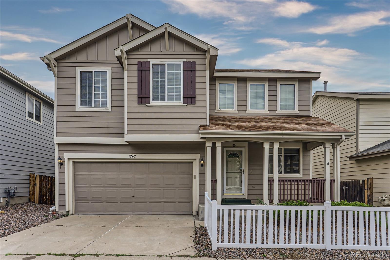 1262 S Boston Court, denver MLS: 7562218 Beds: 5 Baths: 4 Price: $599,000