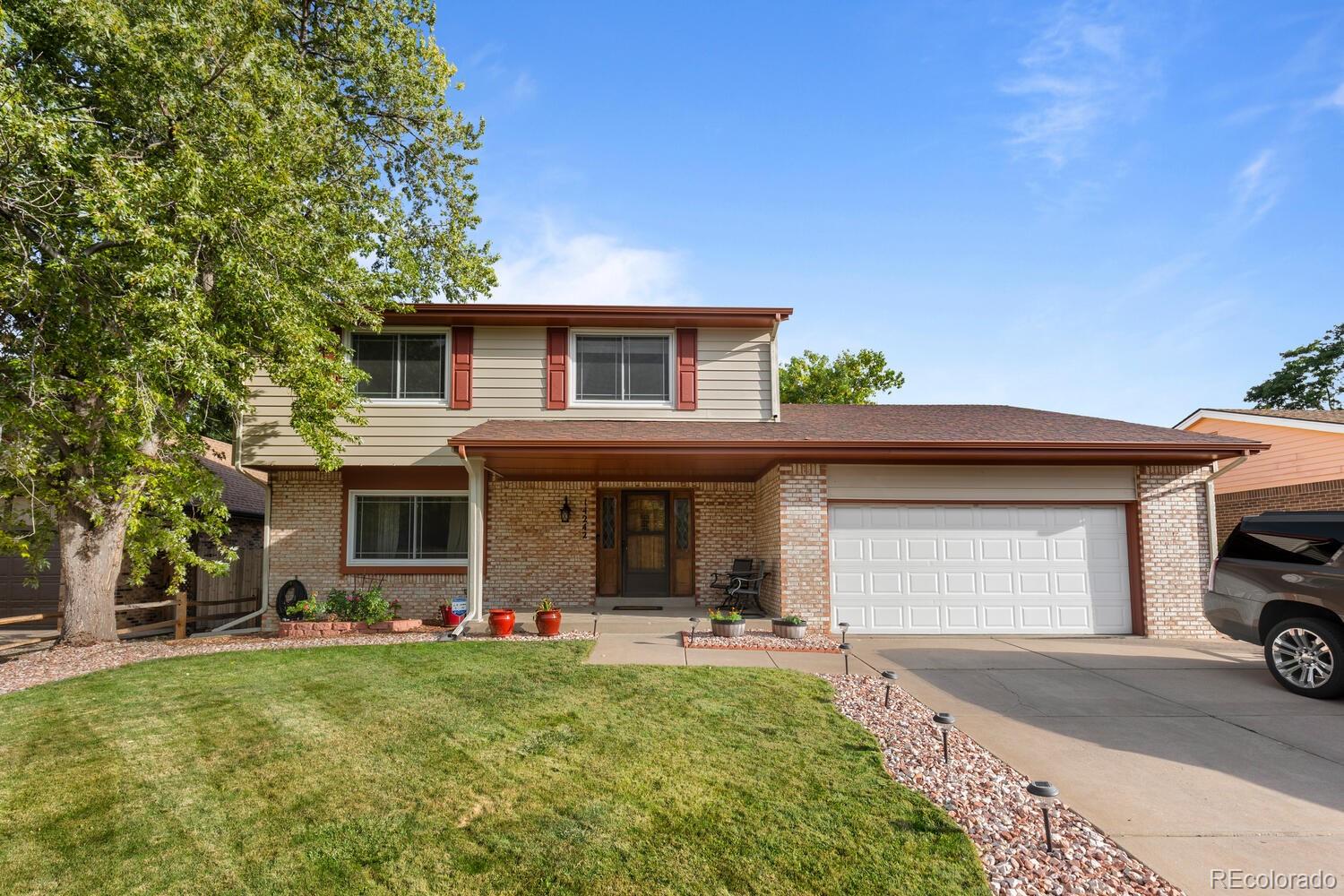 14242 E Idaho Place, aurora MLS: 3034593 Beds: 4 Baths: 3 Price: $520,000