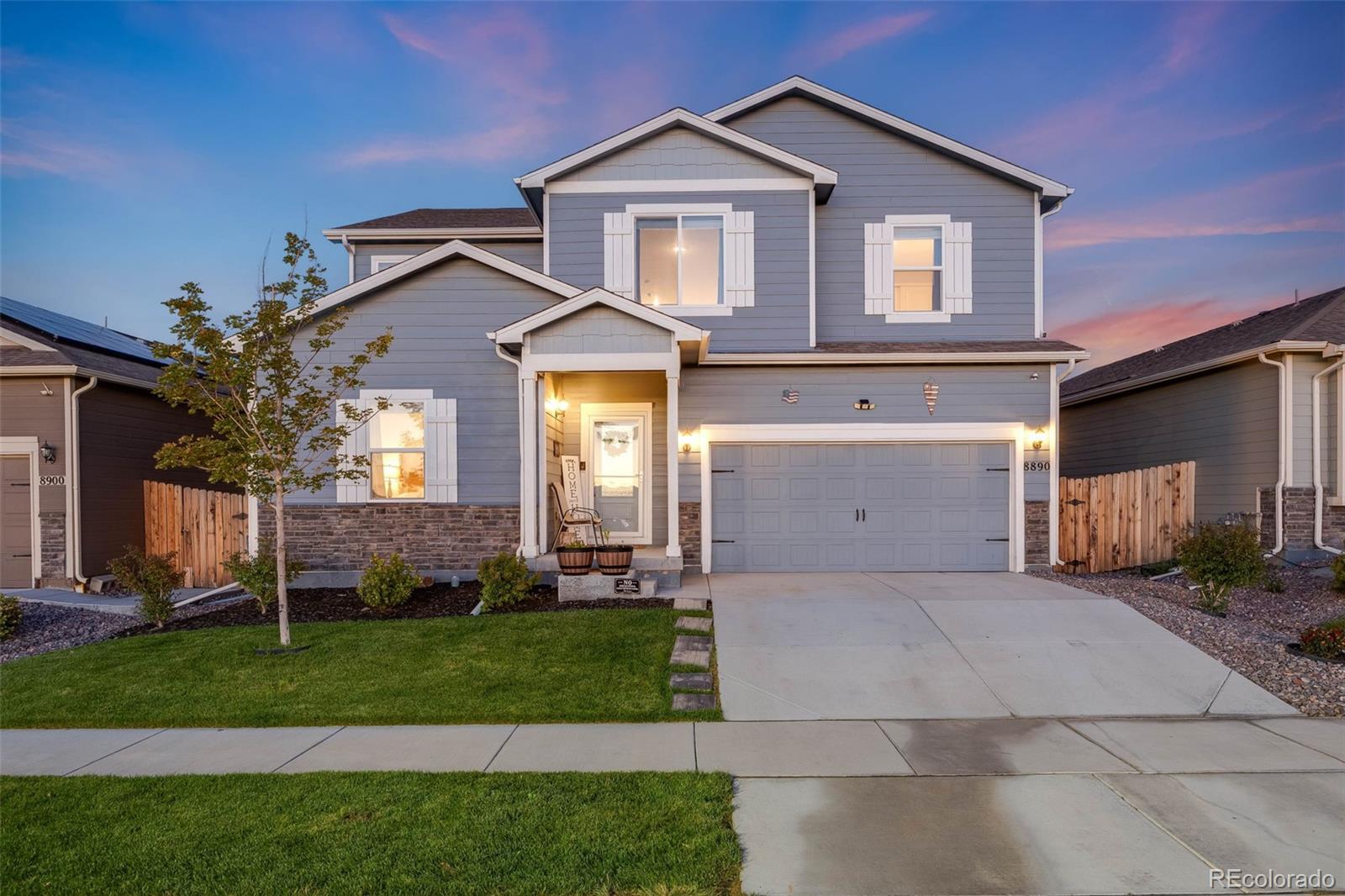 8890  Uravan Street, commerce city MLS: 2717778 Beds: 5 Baths: 3 Price: $575,000