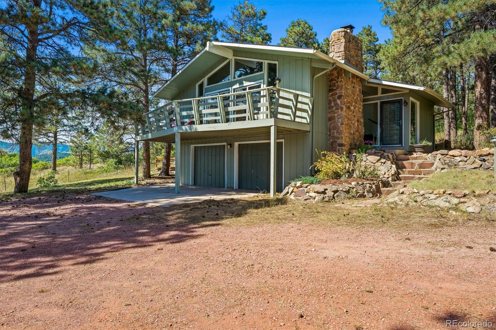 Woodmoor Oaks Monument Home | MLS #: 93874311670  Woodmoor Drive, Monument Beds: 4 Baths: 3 Price: $655,000