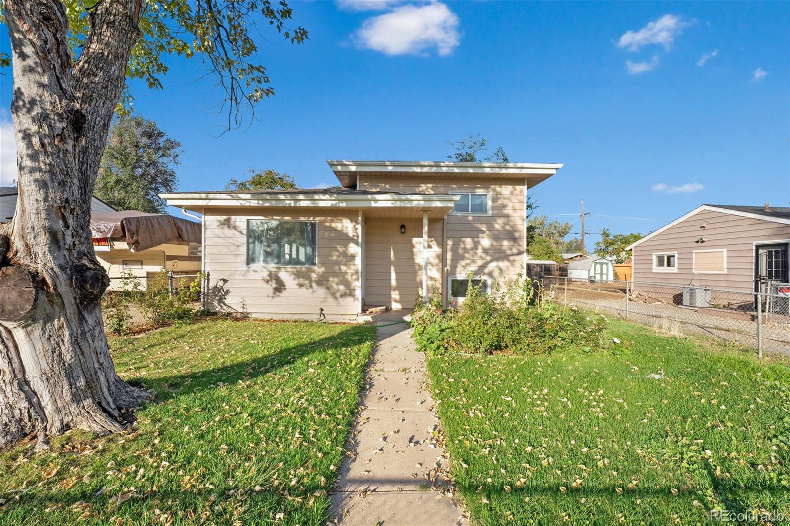 6681  Bellaire Street, commerce city MLS: 1729537 Beds: 3 Baths: 2 Price: $415,000