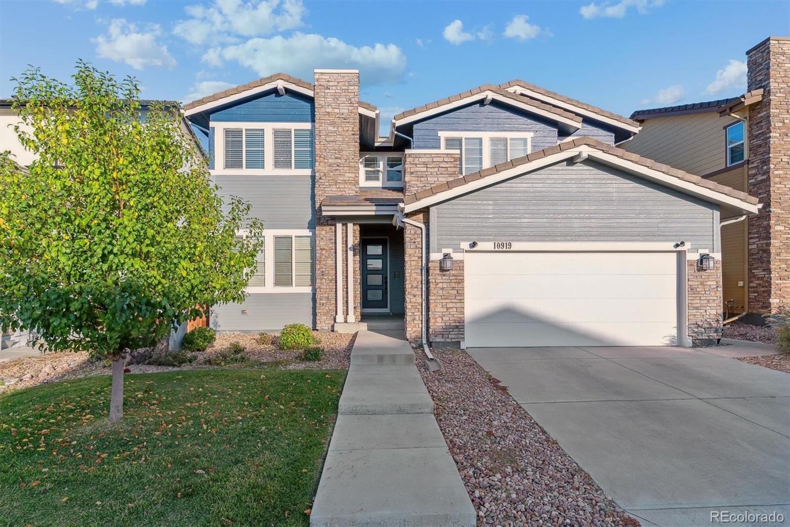 10919  Touchstone Loop, parker MLS: 9023488 Beds: 4 Baths: 4 Price: $750,000