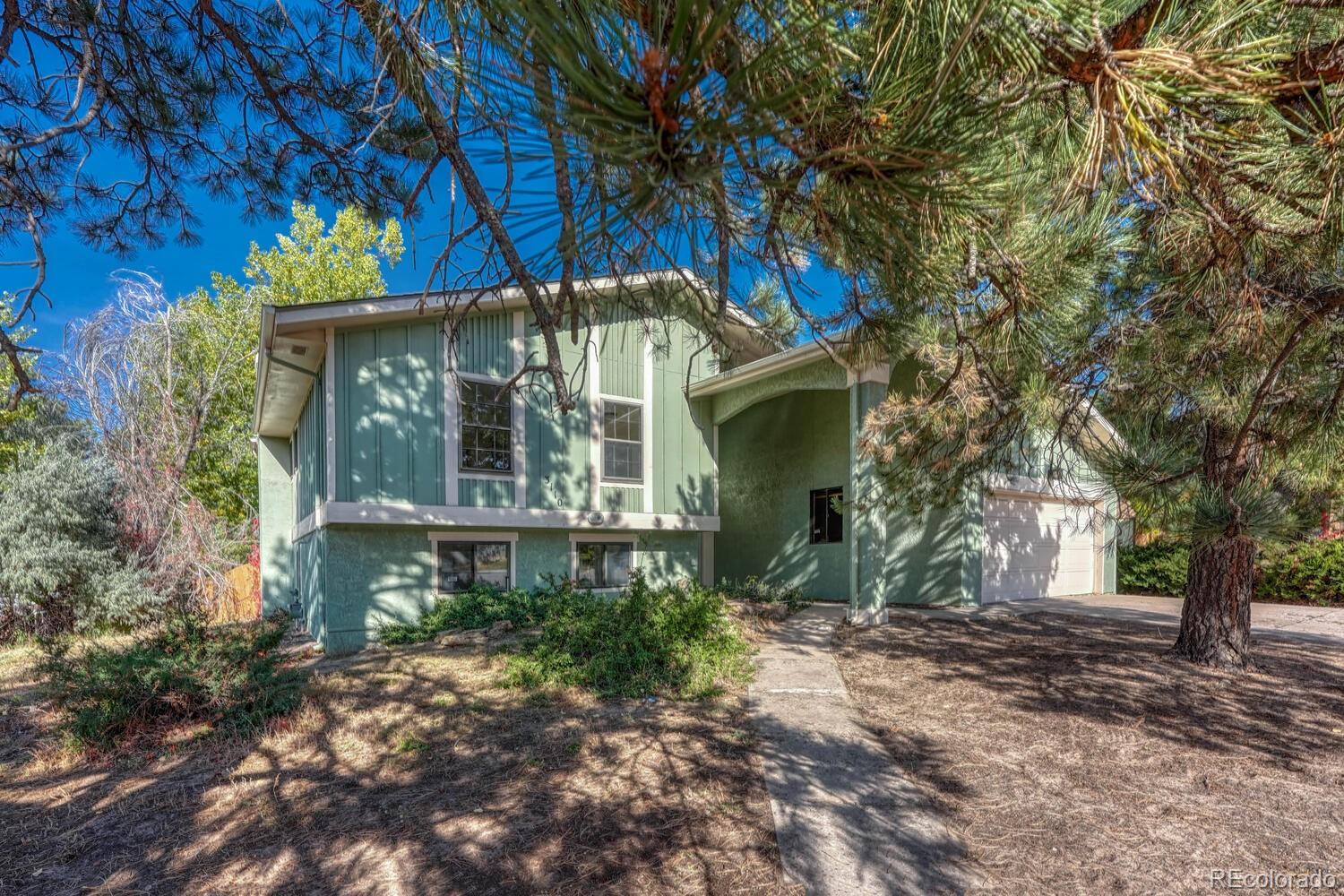 Vista Grande Terrace Colorado Springs Home | MLS #: 15208753110  Vickers Drive, Colorado Springs Beds: 6 Baths: 3 Price: $499,950