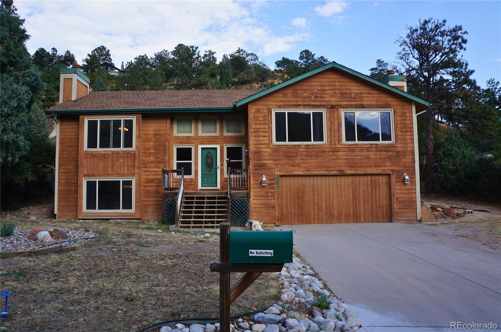 Oak Hills Colorado Springs Home | MLS #: 24818036871  Oak Valley Drive, Colorado Springs Beds: 4 Baths: 3 Price: $499,000
