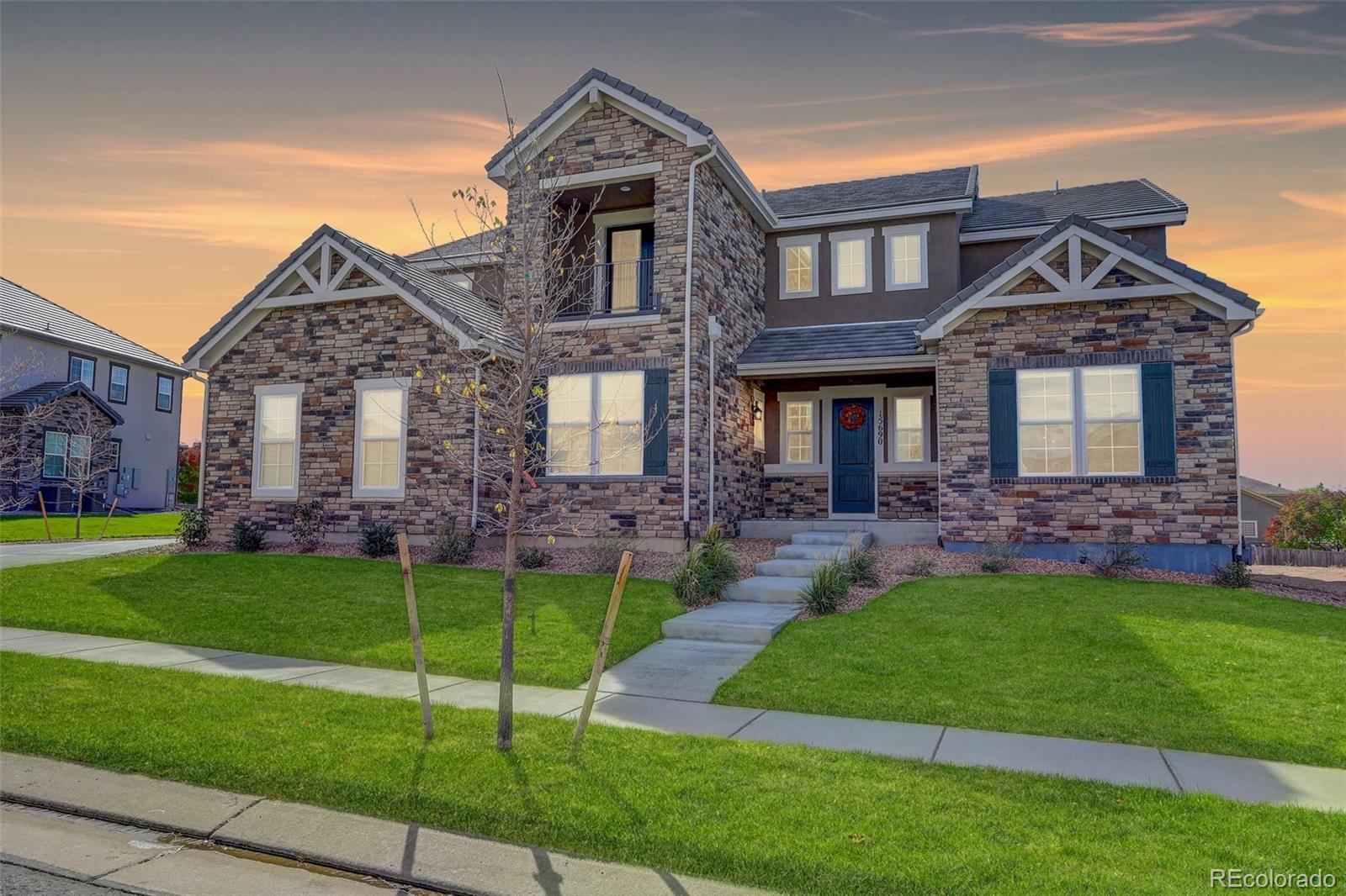 15690  Fairway Drive, commerce city MLS: 8896048 Beds: 6 Baths: 5 Price: $1,199,000