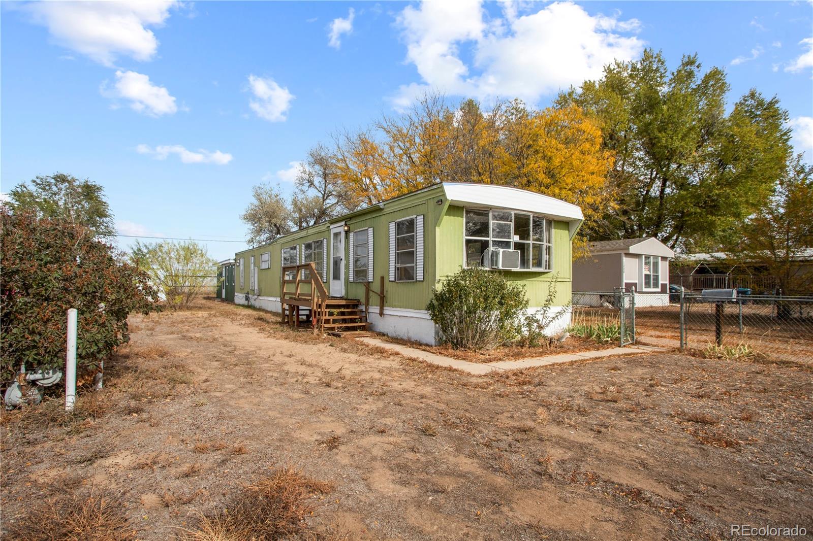 1219  Lilac Drive, lochbuie MLS: 9320332 Beds: 3 Baths: 3 Price: $220,000