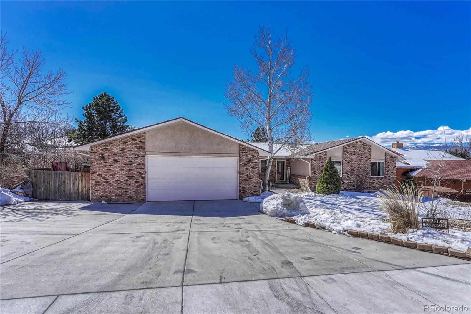 Sunset Mesa Colorado Springs Home | MLS #: 42506603895  Saddle Rock Road, Colorado Springs Beds: 5 Baths: 4 Price: $700,000