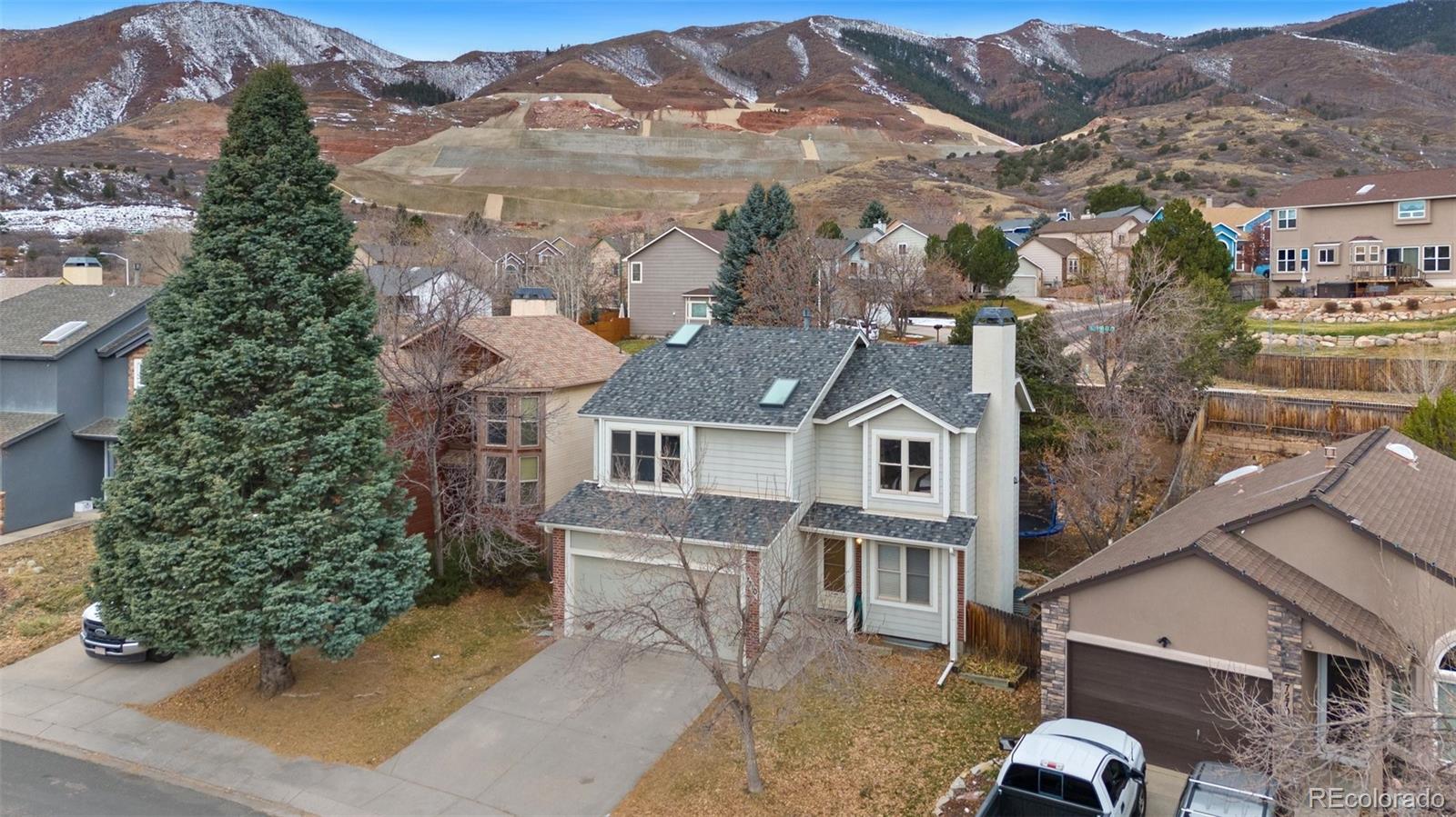 Oaks Colorado Springs Home | MLS #: 82402447310  Brentford Drive, Colorado Springs Beds: 4 Baths: 3 Price: $525,000