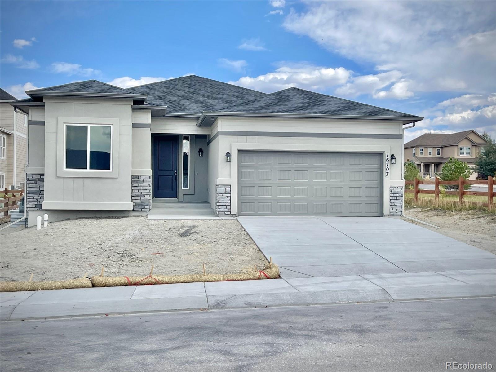 Jackson Creek Monument Home | MLS #: 438244516707  Greyhawk Drive, Monument Beds: 4 Baths: 3 Price: $699,000