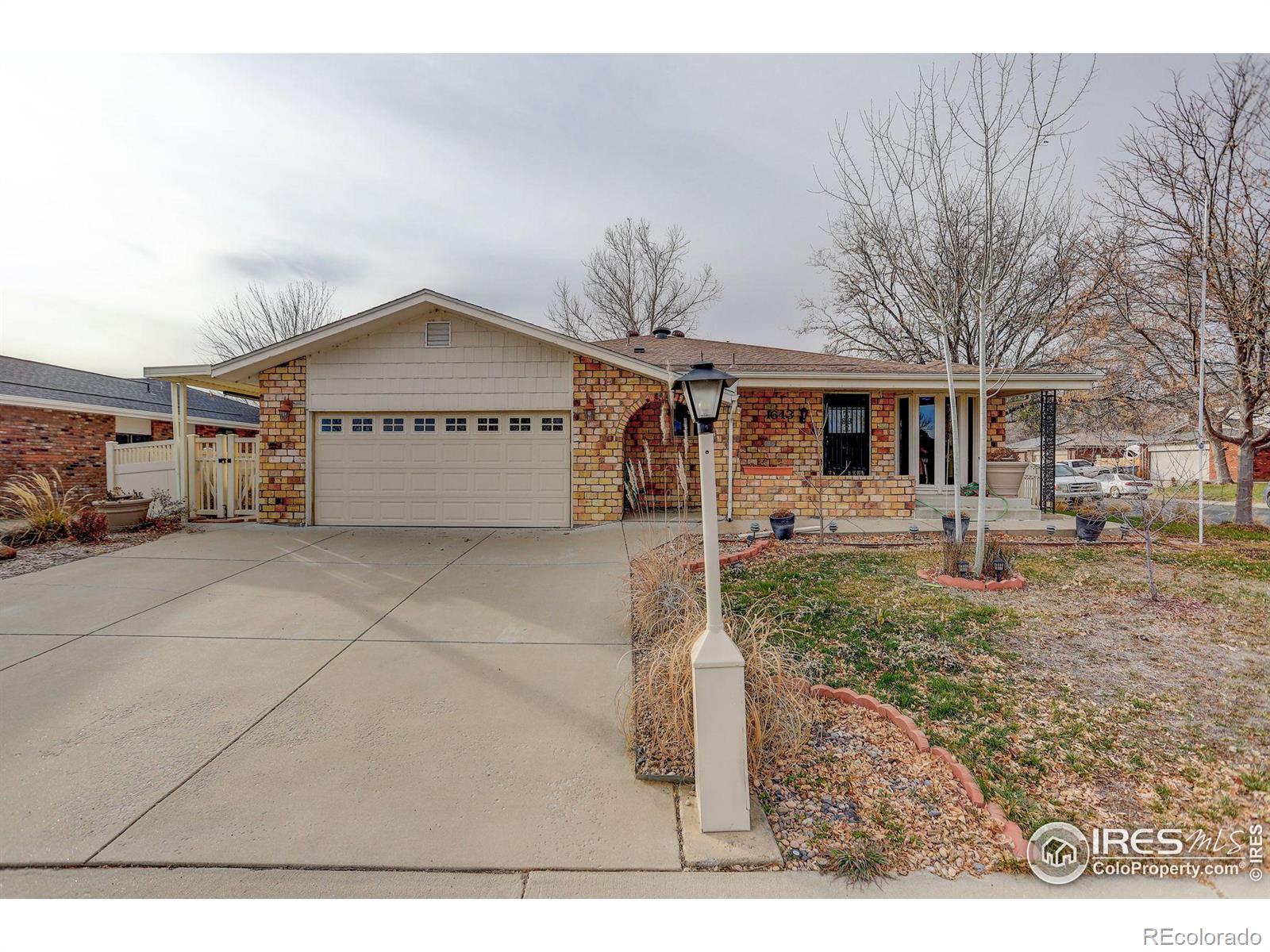 1643  Vivian Street, longmont MLS: 4567891023570 Beds: 4 Baths: 3 Price: $515,000