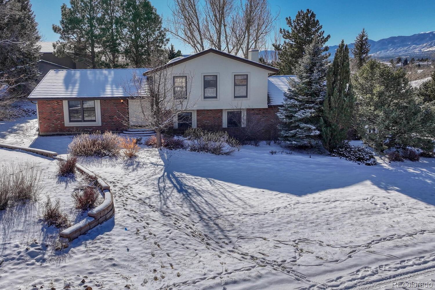 Donala Colorado Springs Home | MLS #: 5361411315  Palm Springs Drive, Colorado Springs Beds: 4 Baths: 4 Price: $599,900