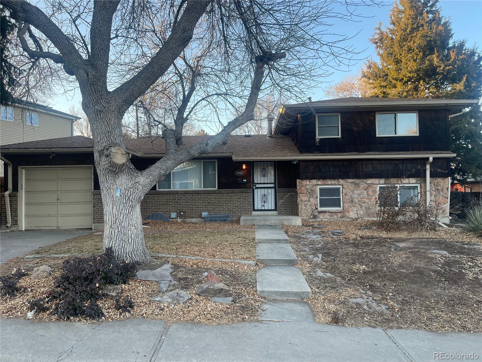 Point South Denver Home | MLS #: 97533412995 S Whiting Way, Denver Beds: 4 Baths: 2 Price: $499,888