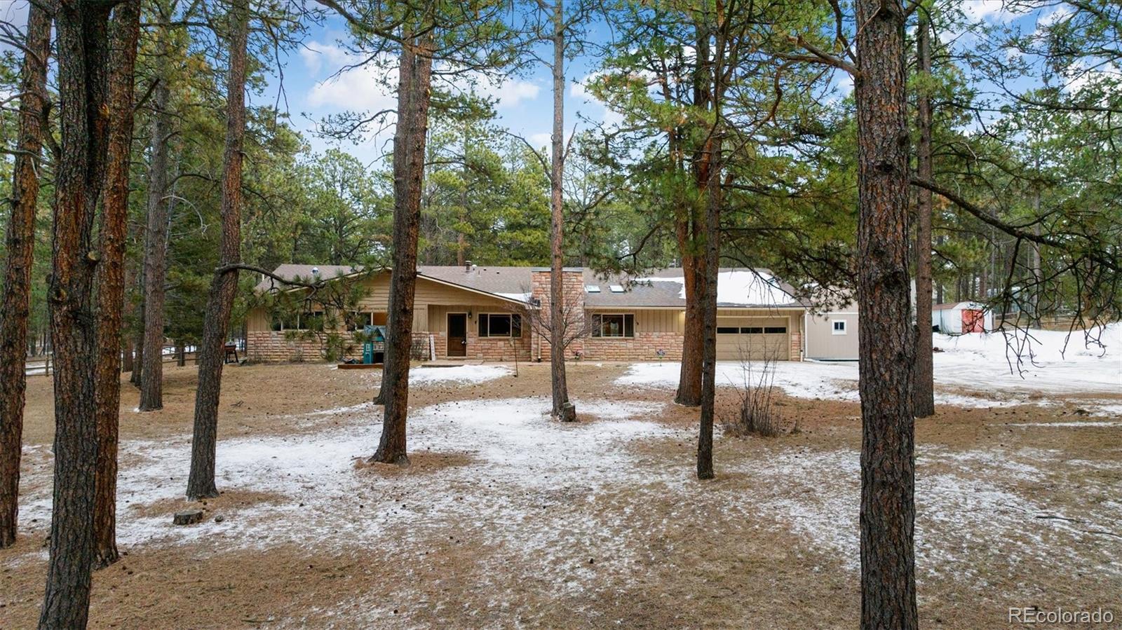 Ponderosa Pines Colorado Springs Home | MLS #: 24654408115  Freeman Drive, Colorado Springs Beds: 4 Baths: 4 Price: $810,000