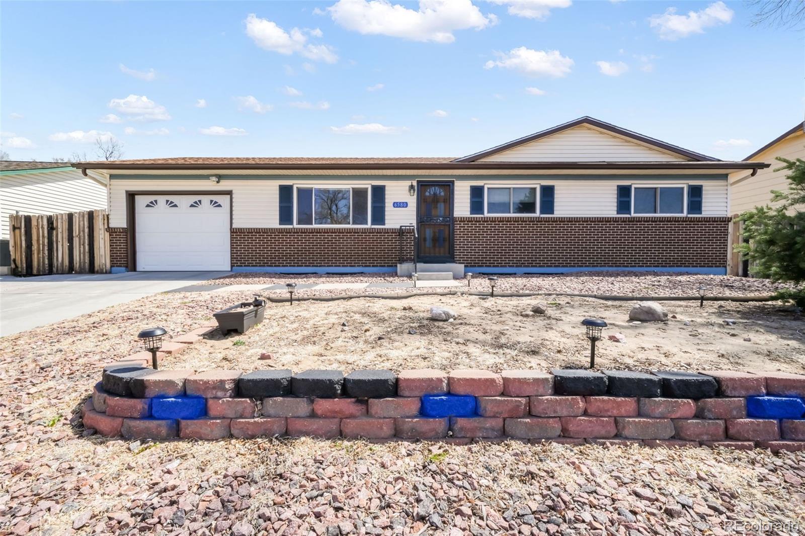 Cimarron Westridge Colorado Springs Home | MLS #: 53500086580  Pahokee Drive, Colorado Springs Beds: 4 Baths: 3 Price: $399,900