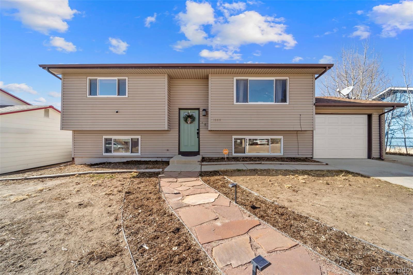 Cimarron Eastridge Colorado Springs Home | MLS #: 68669081660  Mineola Street, Colorado Springs Beds: 4 Baths: 2 Price: $387,500