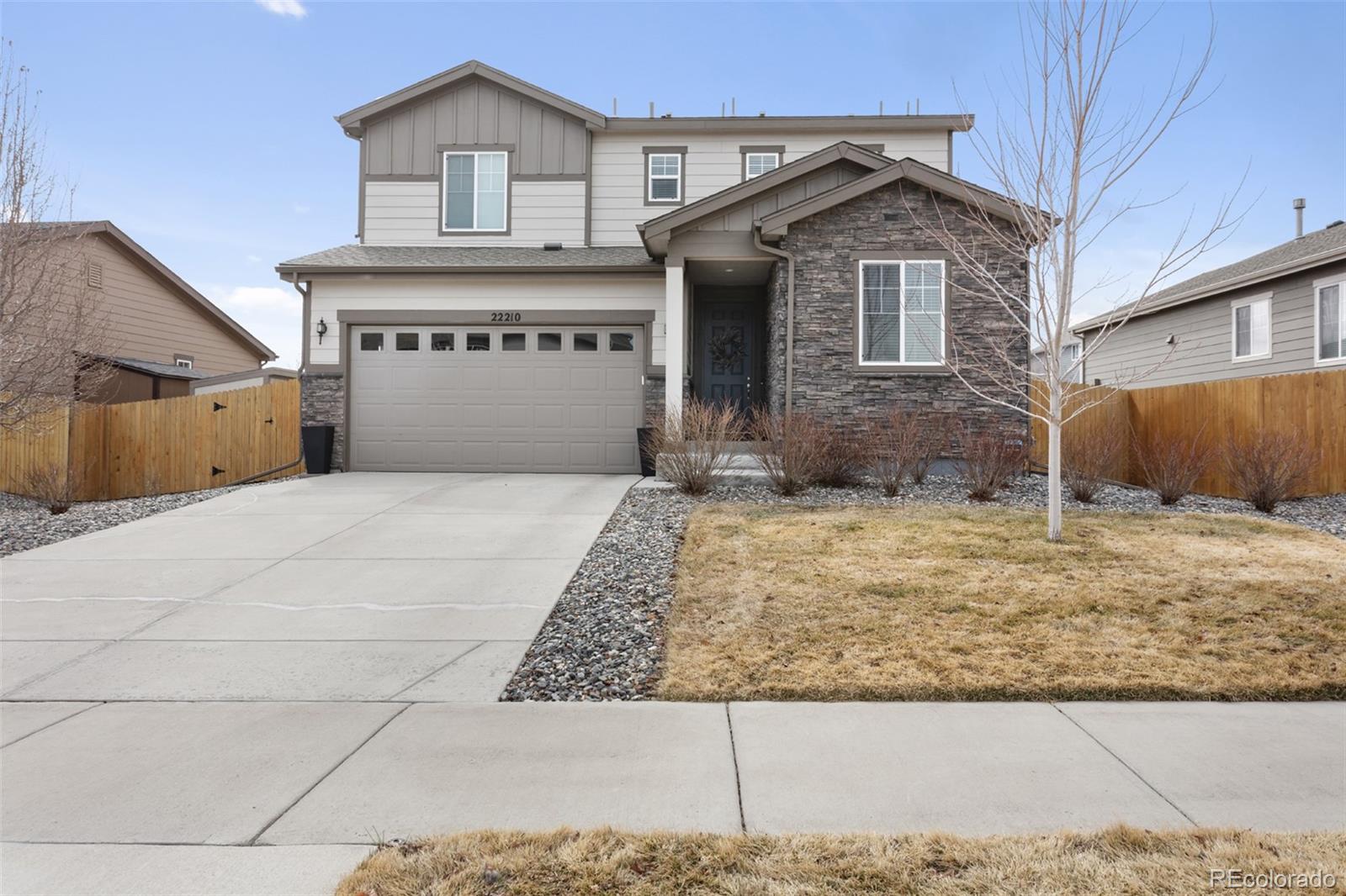 22210 E Mansfield Place, aurora MLS: 2458568 Beds: 4 Baths: 3 Price: $599,000