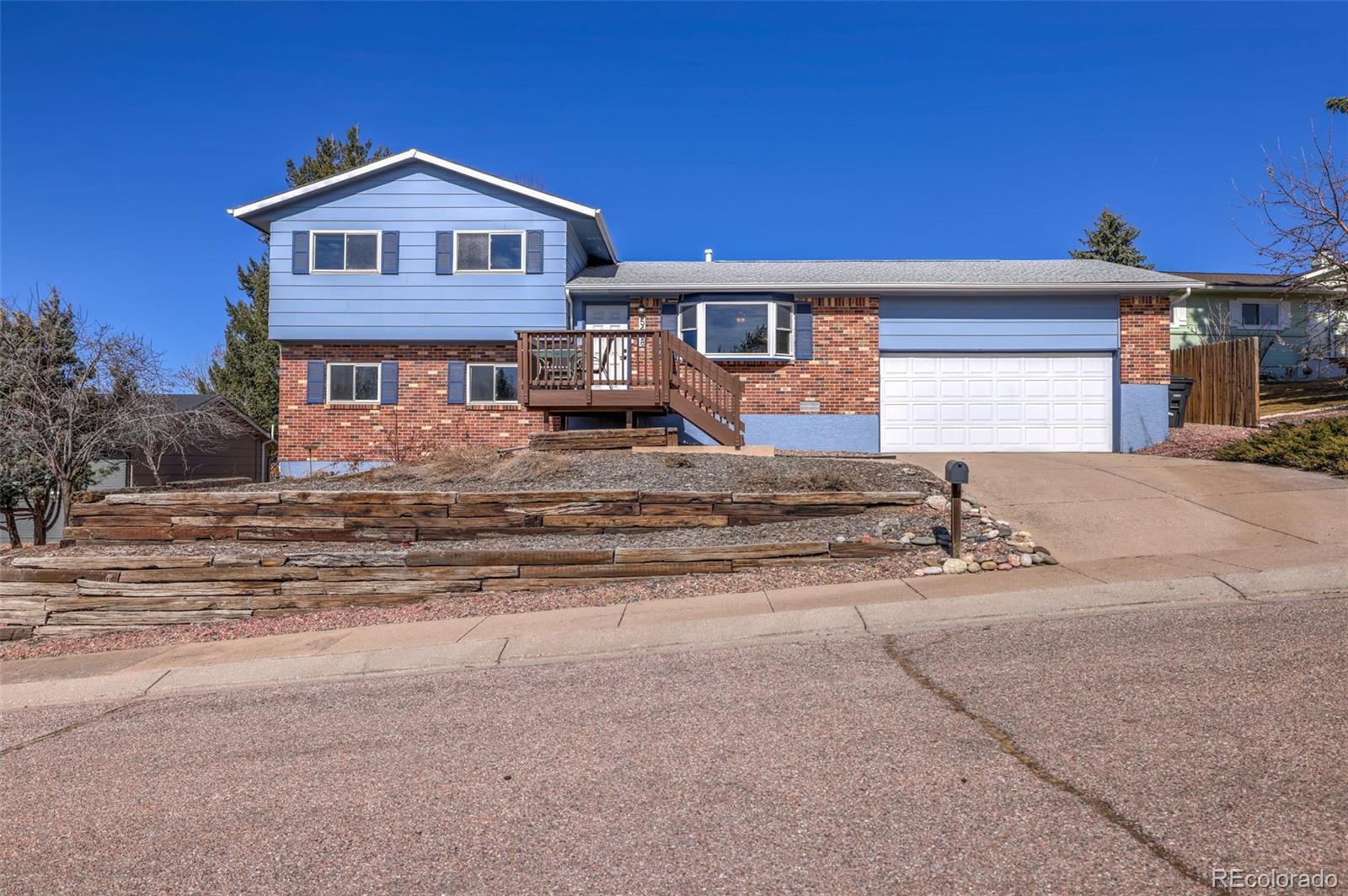 Vista Grande Terrace Colorado Springs Home | MLS #: 33003735408  Escondido Court, Colorado Springs Beds: 4 Baths: 2 Price: $415,000