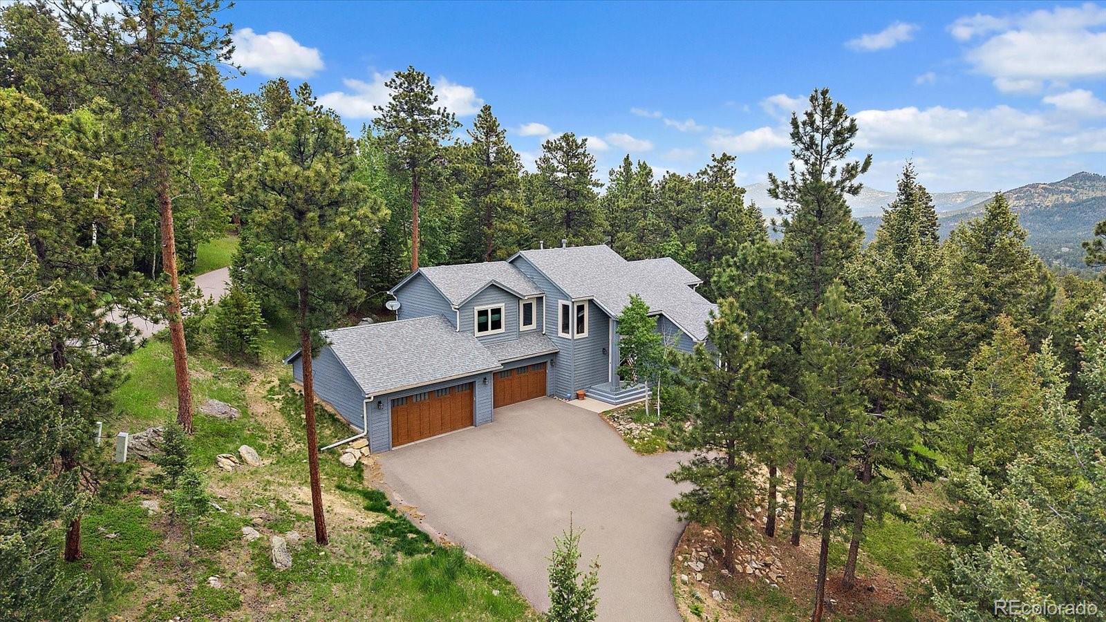 Cragmont Evergreen Home | MLS #: 91830996637  Berry Bush Lane, Evergreen Beds: 4 Baths: 4 Price: $940,000
