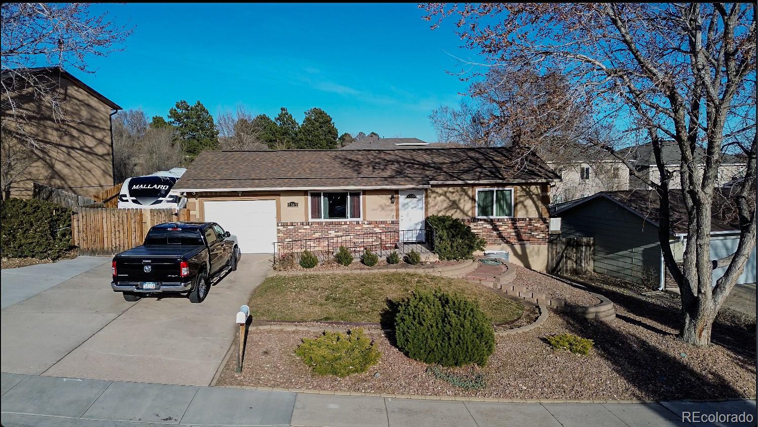 Vista Grande Colorado Springs Home | MLS #: 66030095365  Fiesta , Colorado Springs Beds: 4 Baths: 3 Price: $499,999