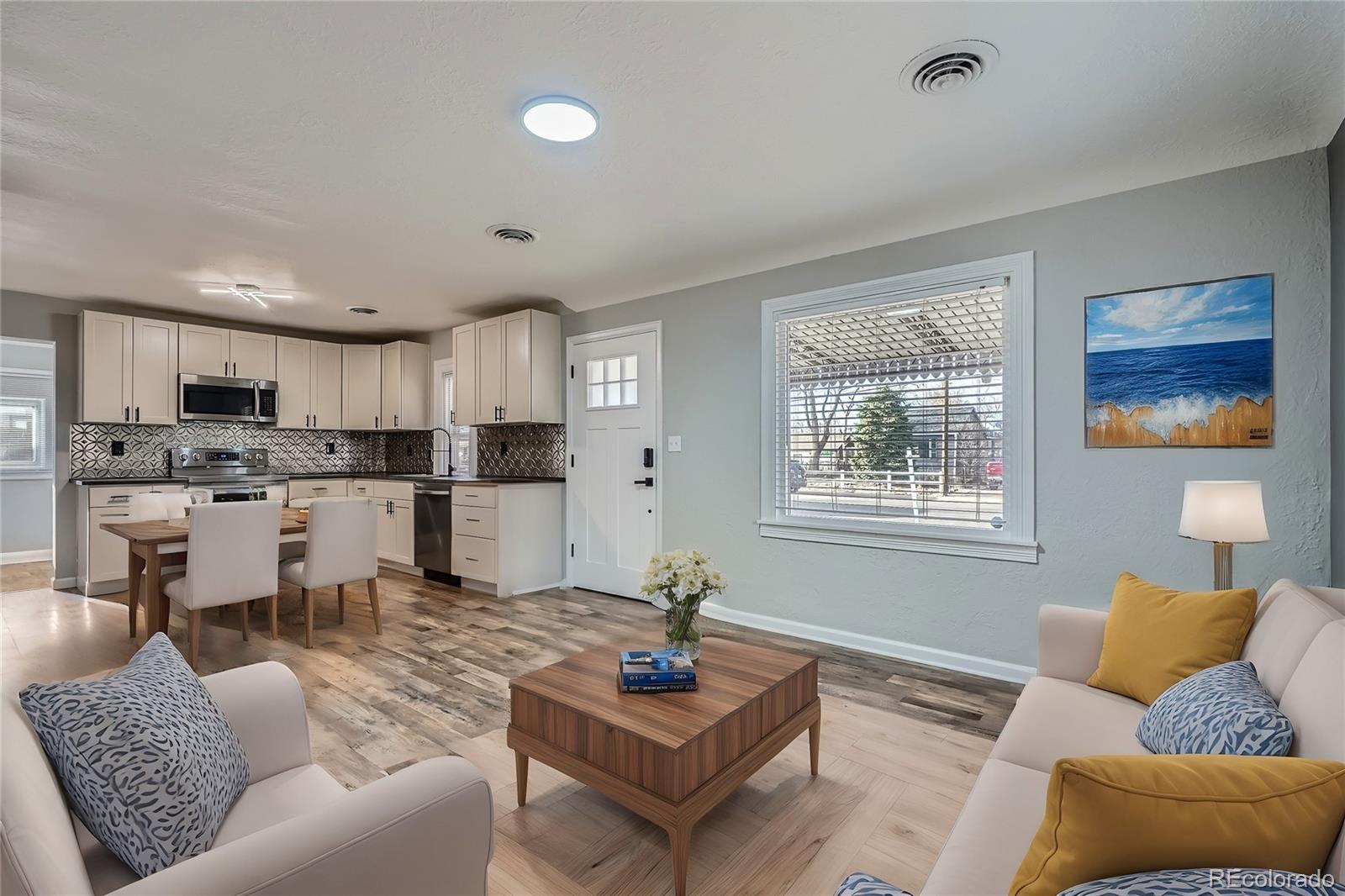 6690 E 72 Place, commerce city MLS: 6947921 Beds: 3 Baths: 2 Price: $415,000