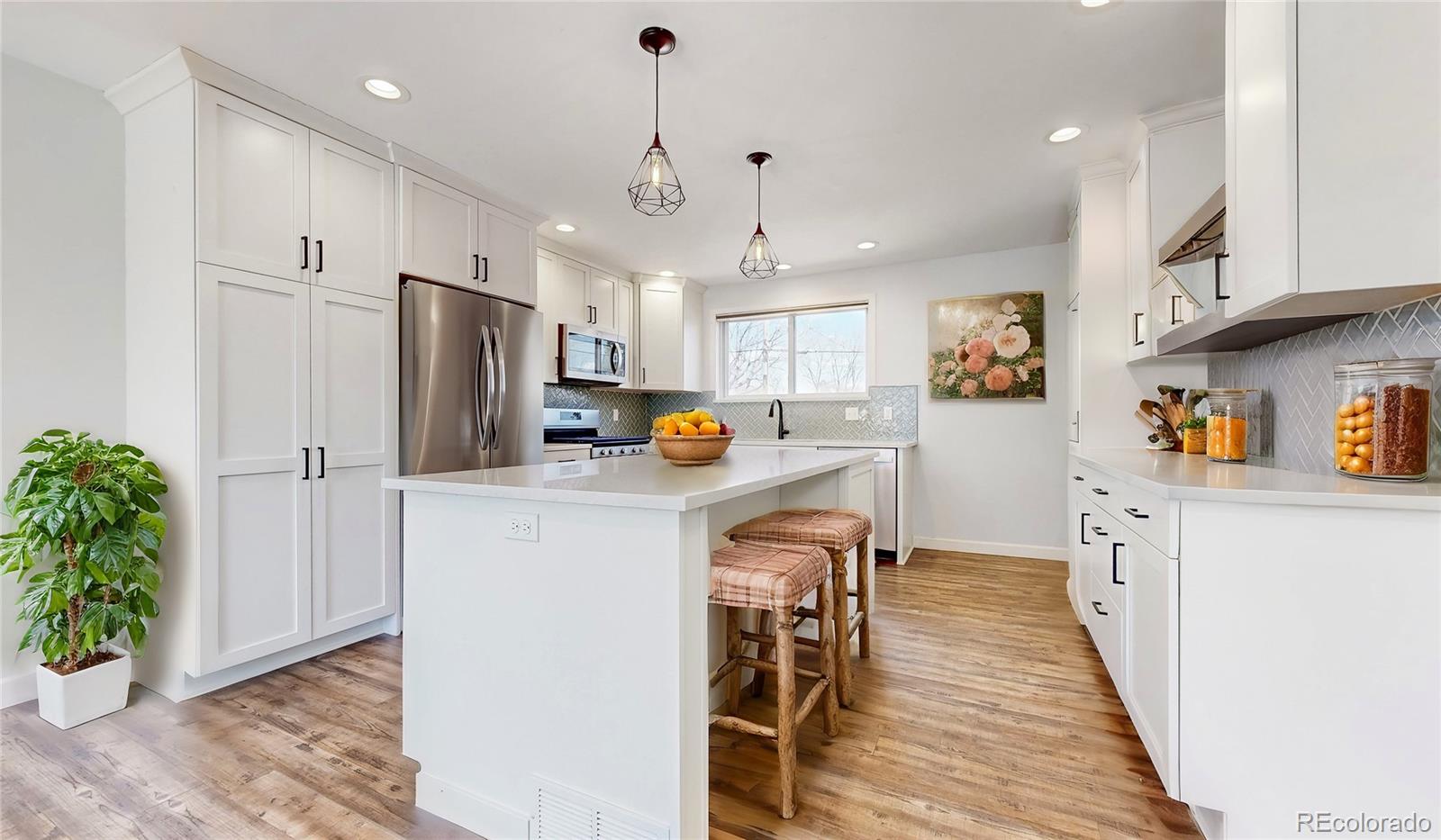 7818  Florado Street, denver MLS: 5405354 Beds: 4 Baths: 2 Price: $469,000