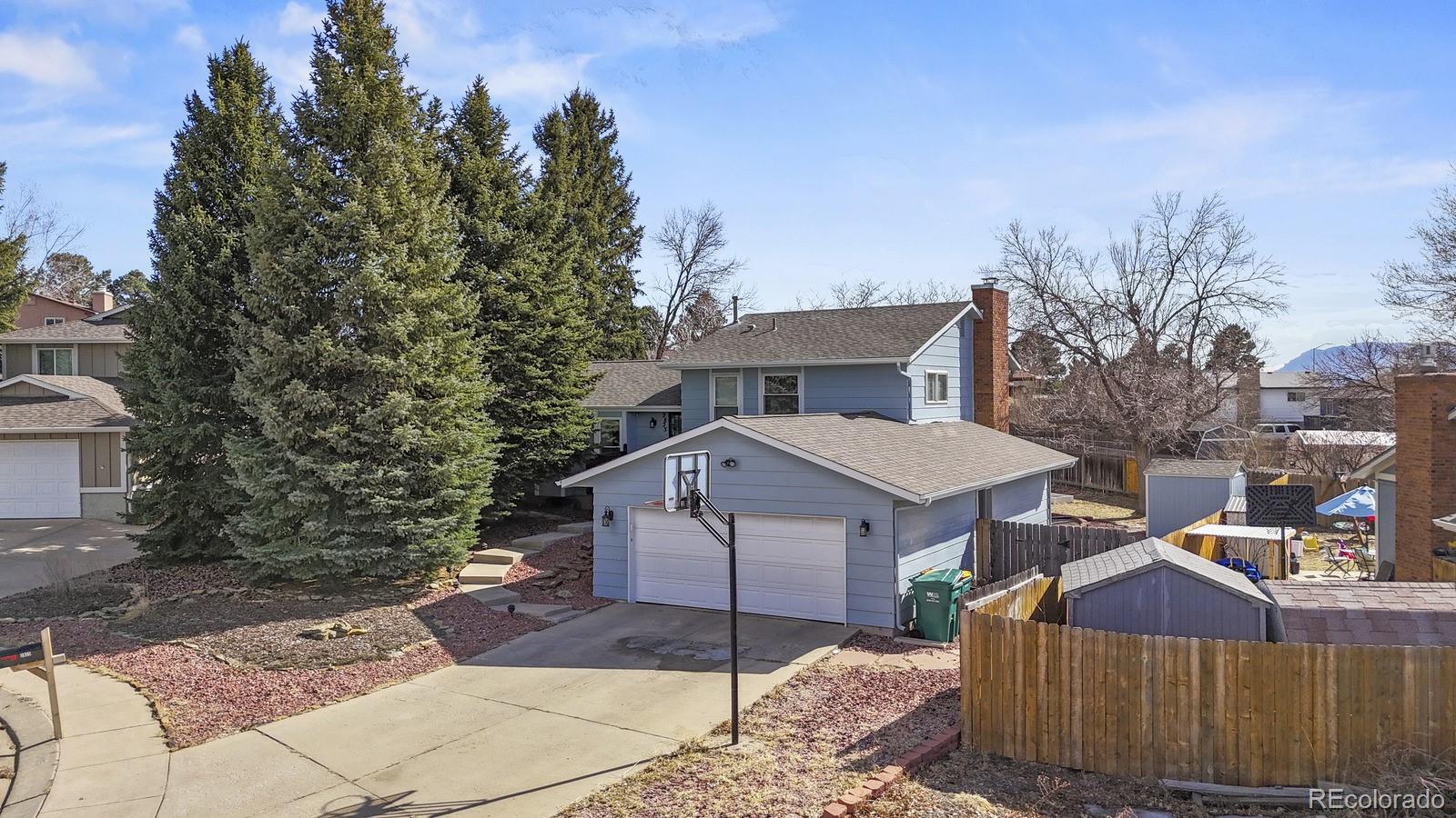 Cresta Vista Colorado Springs Home | MLS #: 21754492825  Downhill Drive, Colorado Springs Beds: 4 Baths: 3 Price: $500,000