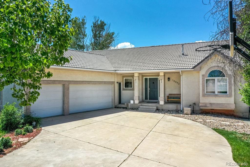 Peaceful Valley Country Club Colorado Springs Home | MLS #: 470514310042  Rolling Ridge Road, Colorado Springs Beds: 4 Baths: 3 Price: $640,000