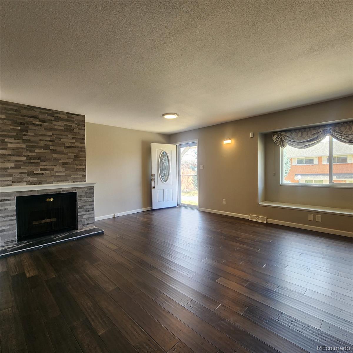 9017 E Oxford Drive , Denver  MLS: 4102226 Beds: 4 Baths: 4 Price: $425,000
