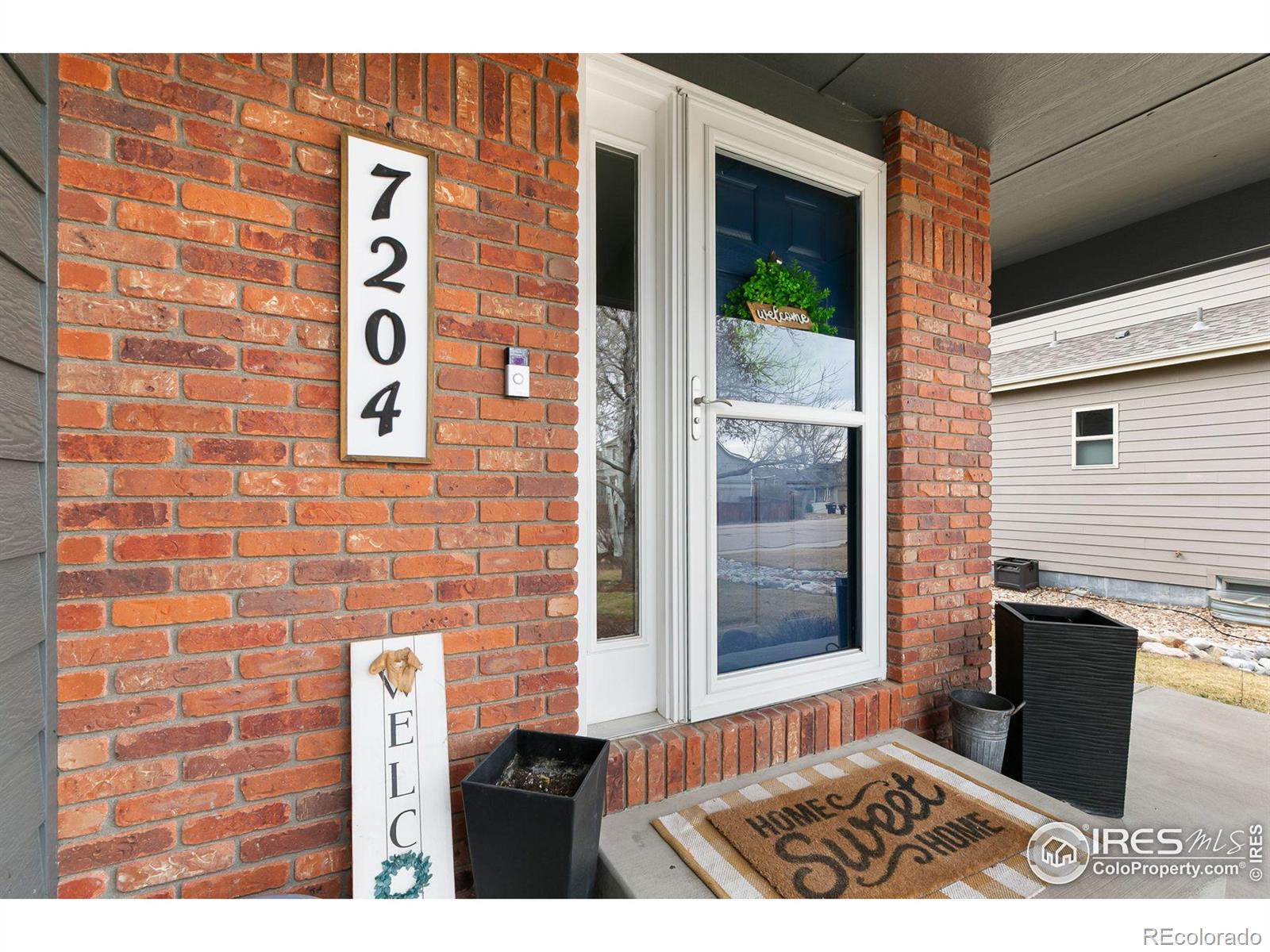 7204 W 23rd St Rd, greeley MLS: 4567891028862 Beds: 5 Baths: 4 Price: $585,000