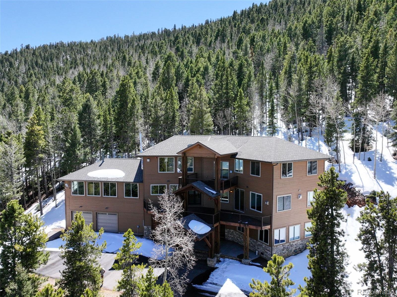 Conifer Mountain Conifer Home | MLS #: 704375410508  Christopher Drive, Conifer Beds: 4 Baths: 5 Price: $999,900