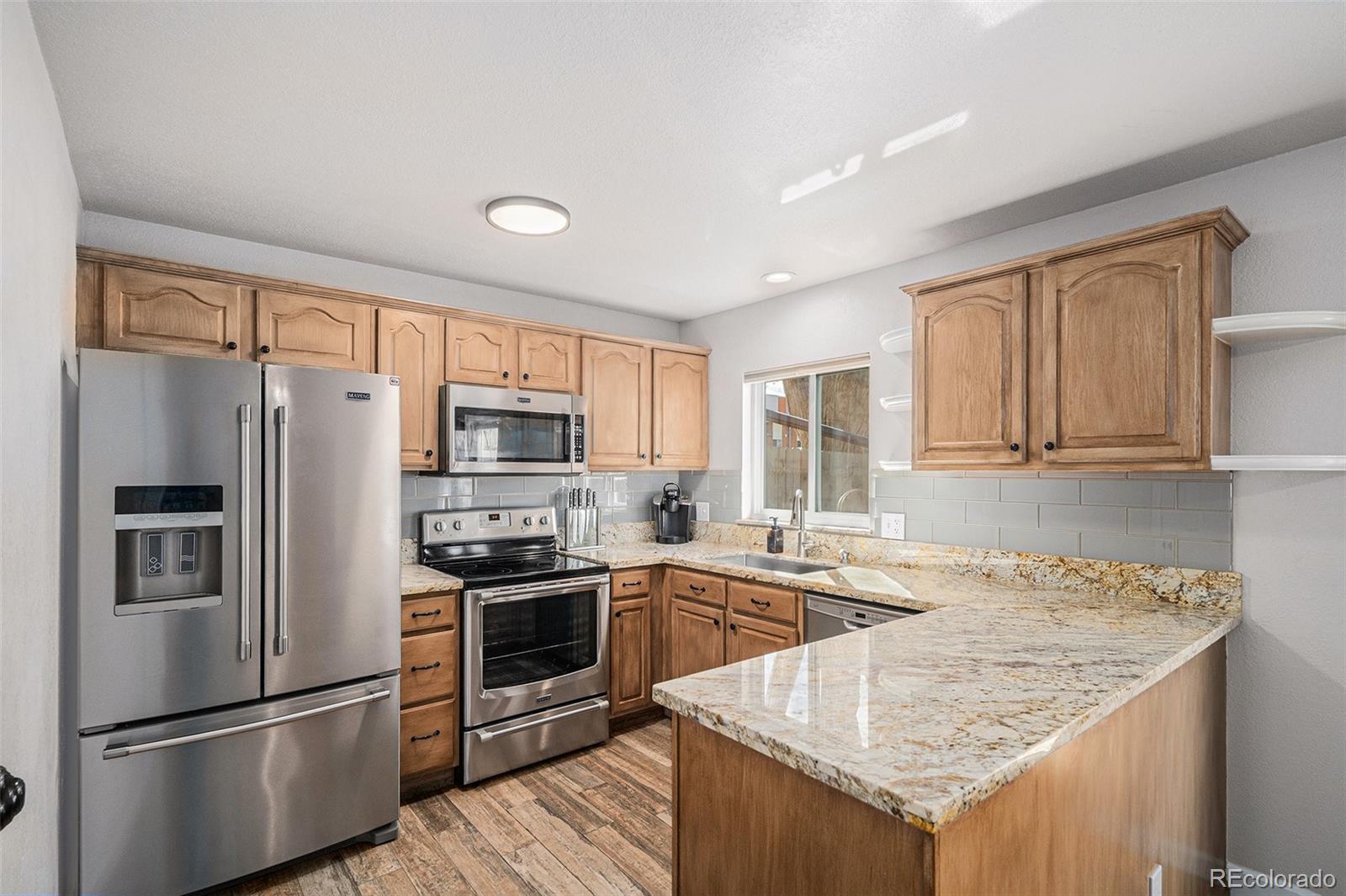 4695 S Lowell Boulevard , Denver  MLS: 4348020 Beds: 2 Baths: 3 Price: $340,000