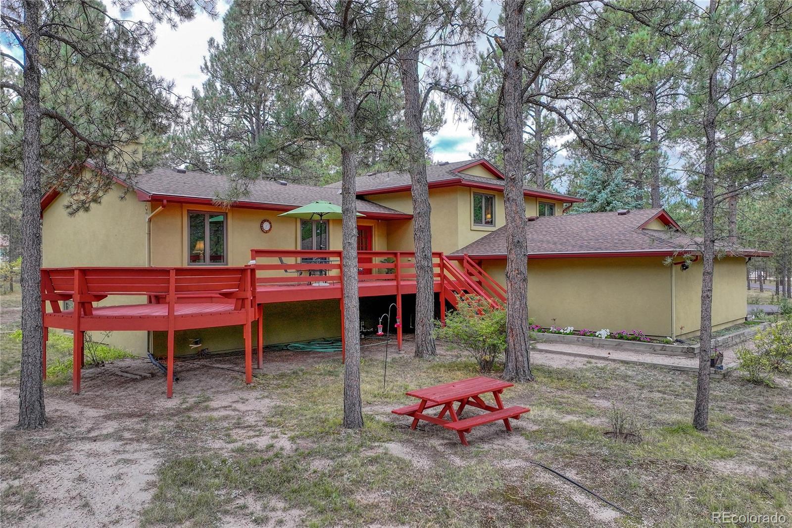 Wildwood Colorado Springs Home | MLS #: 24465188510  Wilderness Drive, Colorado Springs Beds: 4 Baths: 3 Price: $799,000