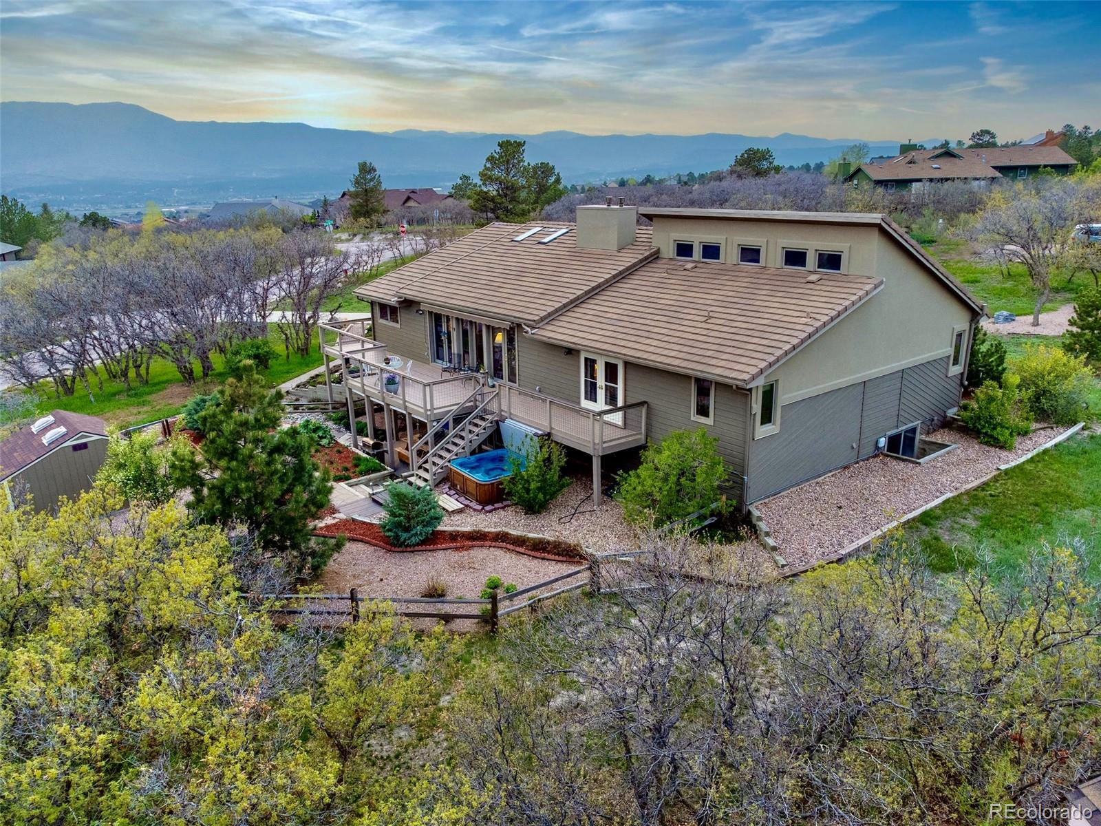 Woodmoor Monument Home | MLS #: 9983319440  Scrub Oak Circle, Monument Beds: 5 Baths: 3 Price: $899,000