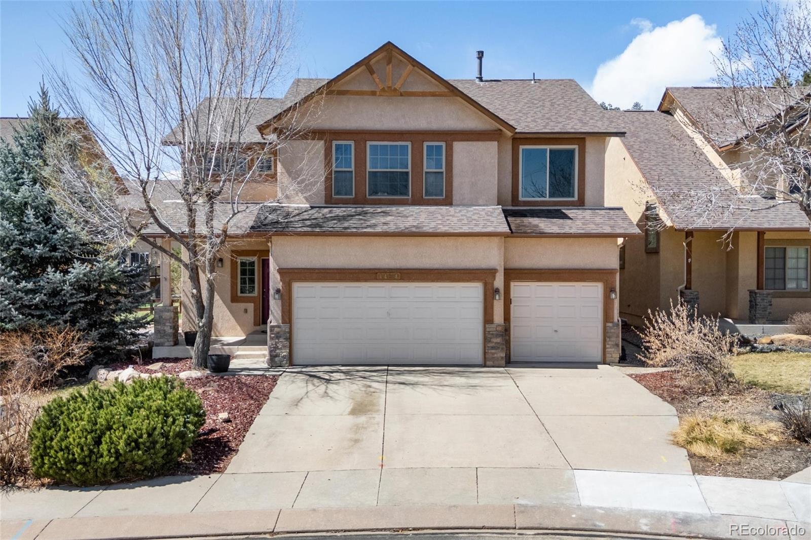 Campus Bluffs Colorado Springs Home | MLS #: 39934774454  College Park Court, Colorado Springs Beds: 3 Baths: 3 Price: $555,000