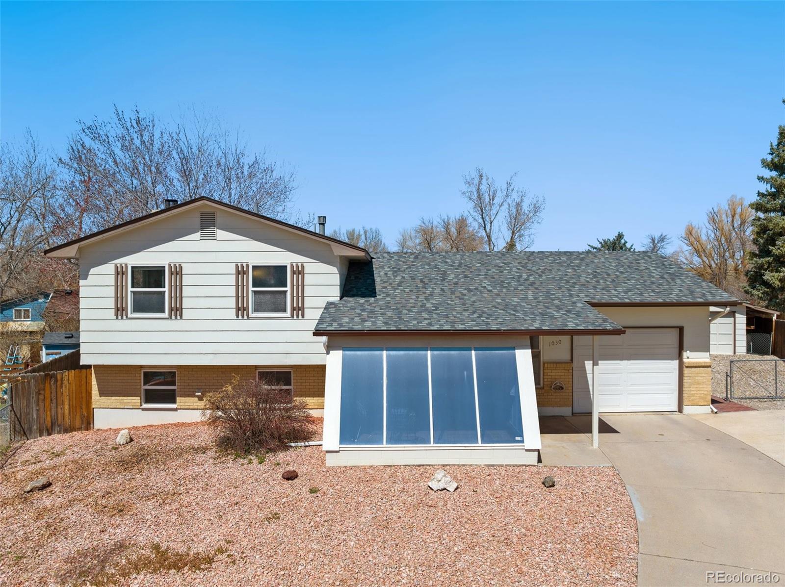 Widefield Country Club Estates Colorado Springs Home | MLS #: 28252171030  De La Vista Place, Colorado Springs Beds: 4 Baths: 2 Price: $400,000