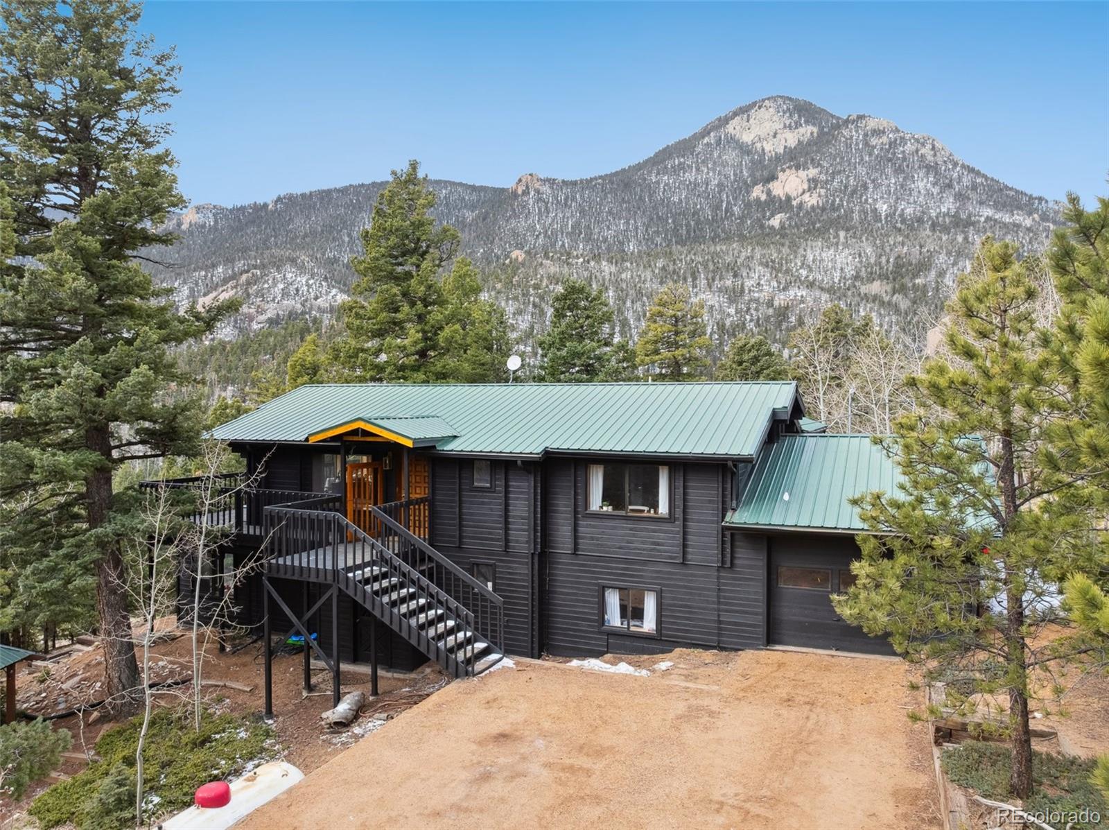 Crystal Park Manitou Springs Home | MLS #: 30447646215  Aspen Ridge Road, Manitou Springs Beds: 3 Baths: 3 Price: $624,900