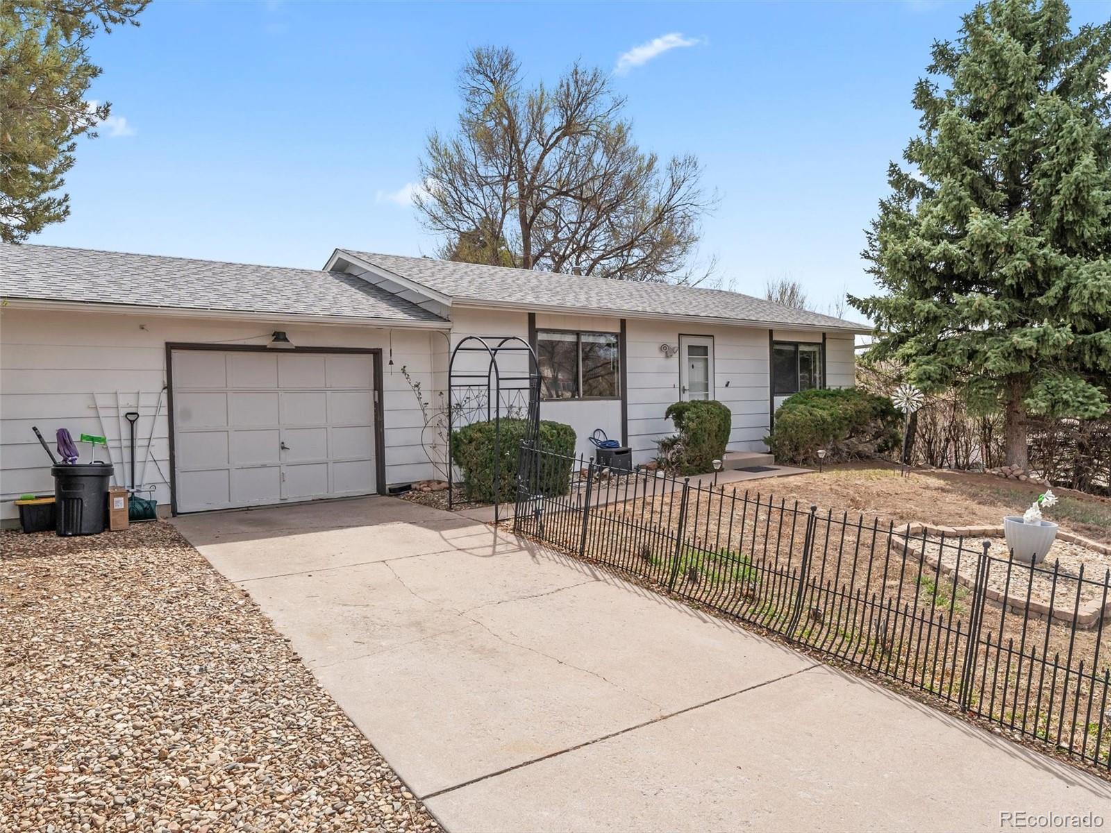 Sunrise Ridge Colorado Springs Home | MLS #: 39526667515  Woodstock Street, Colorado Springs Beds: 2 Baths: 1 Price: $279,999