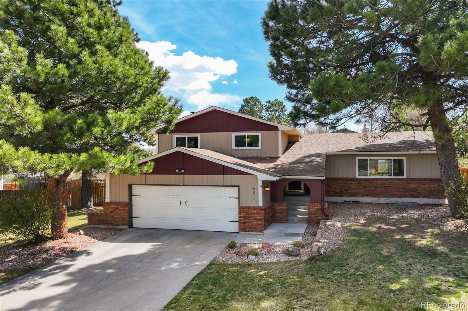 Erindale Colorado Springs Home | MLS #: 18965796311  Altman Drive, Colorado Springs Beds: 3 Baths: 3 Price: $465,000