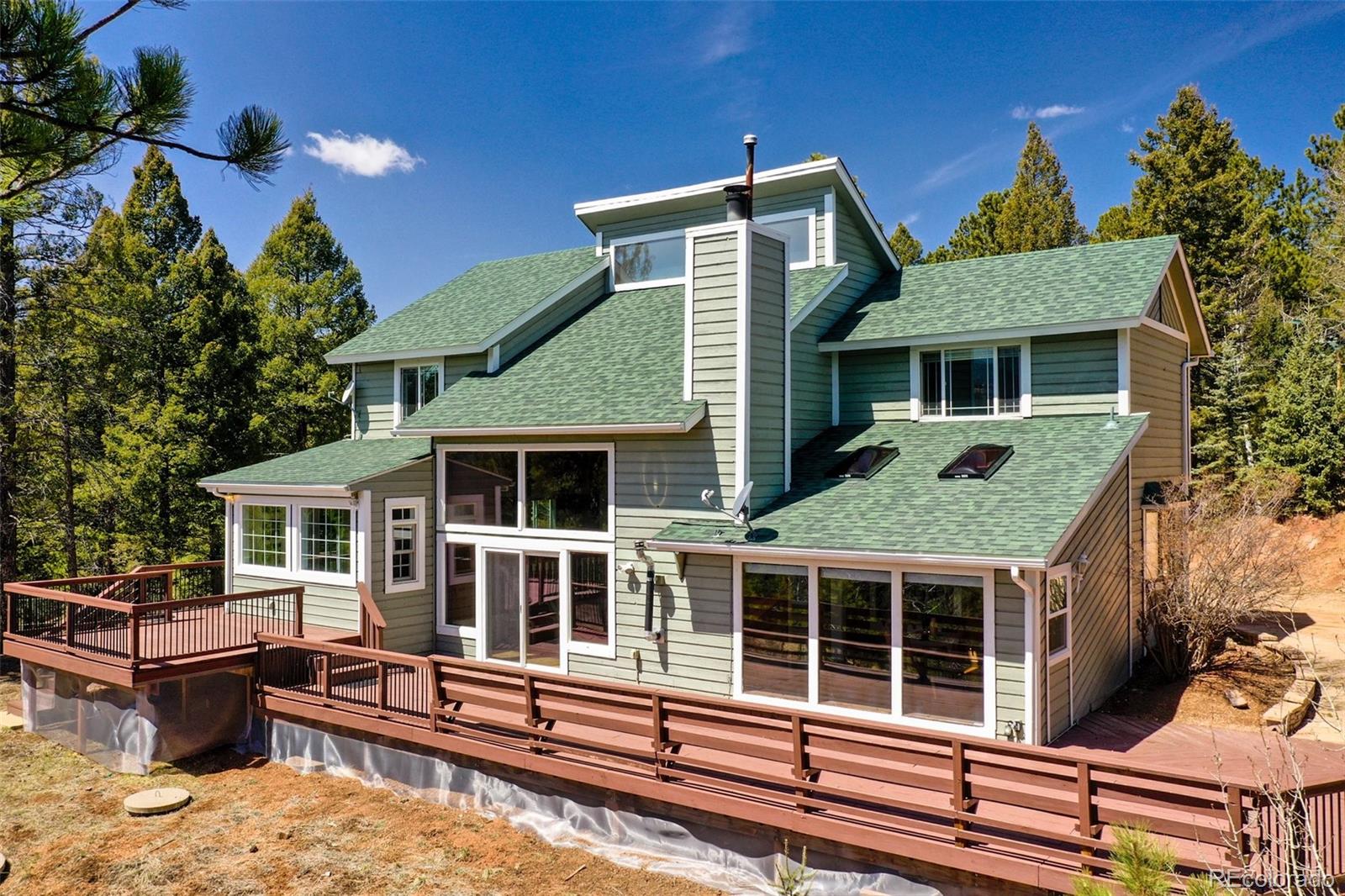 Rosewood Hills Woodland Park Home | MLS #: 4651601131  Aspen Drive, Woodland Park Beds: 4 Baths: 4 Price: $775,000