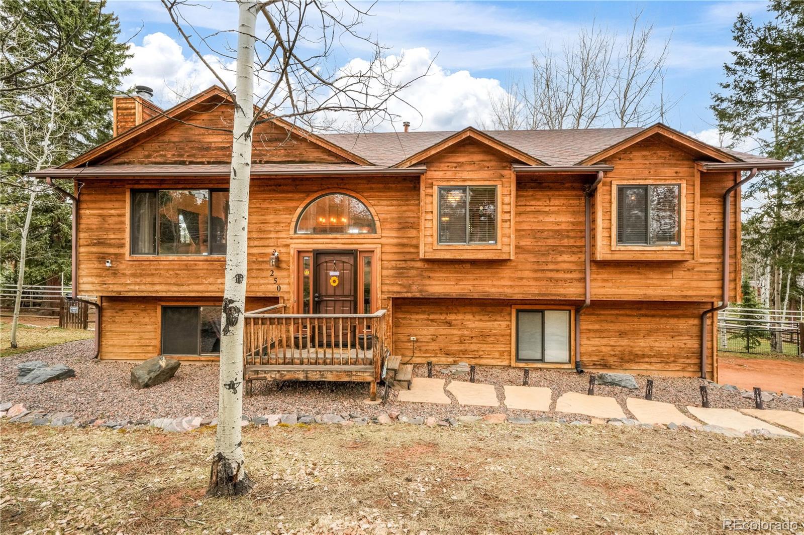 Sunny Slope Acres Woodland Park Home | MLS #: 1671095250  Bridle Drive, Woodland Park Beds: 3 Baths: 3 Price: $574,900